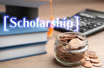 Image of Scholarship. Jar of coins, books, graduate hat and calculator on wooden table