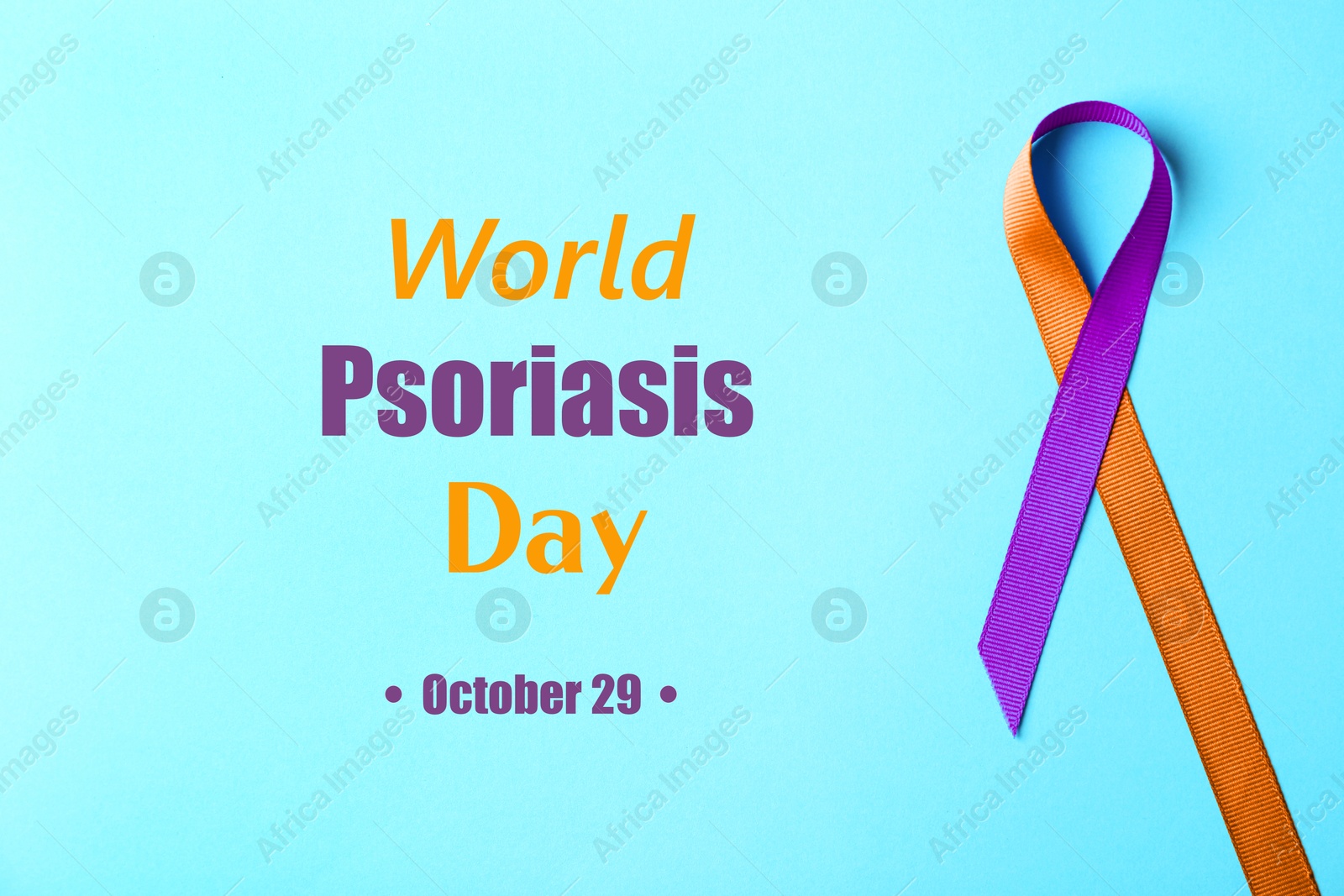 Image of World Psoriasis Day (October, 29). Orange-orchid awareness ribbon on light blue background, top view