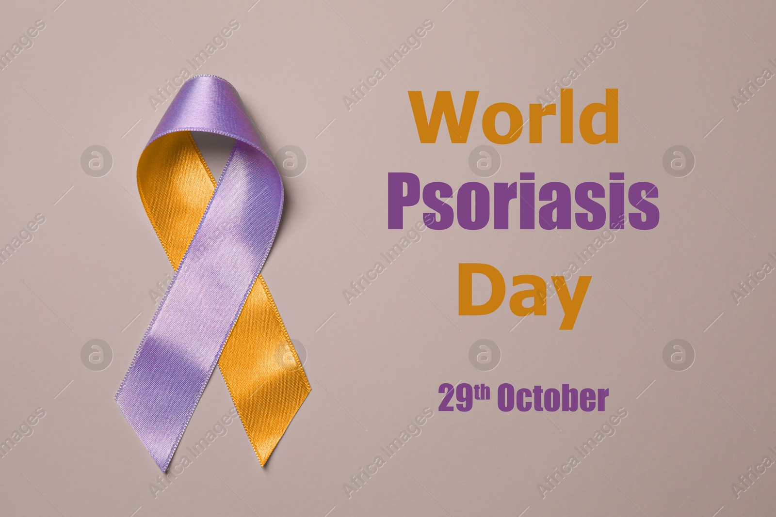 Image of World Psoriasis Day (October, 29). Orange-orchid awareness ribbon on dark beige background, top view