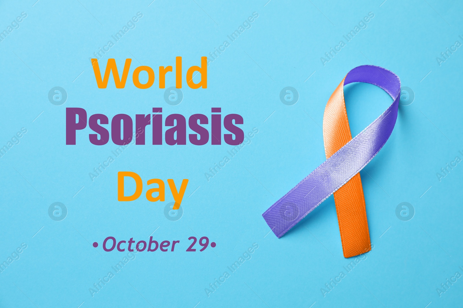 Image of World Psoriasis Day (October, 29). Orange-orchid awareness ribbon on light blue background, top view