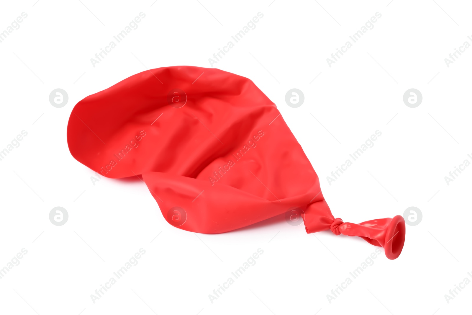 Photo of One red popped balloon isolated on white