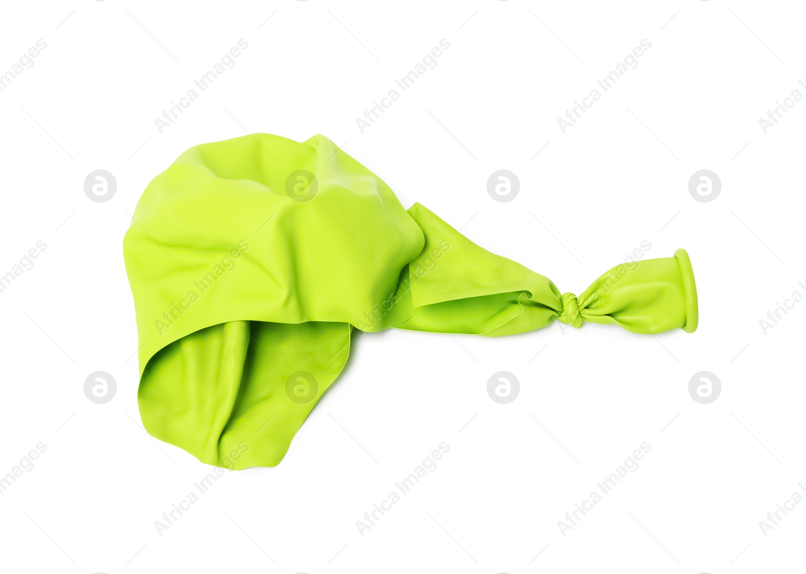 Photo of One green popped balloon isolated on white