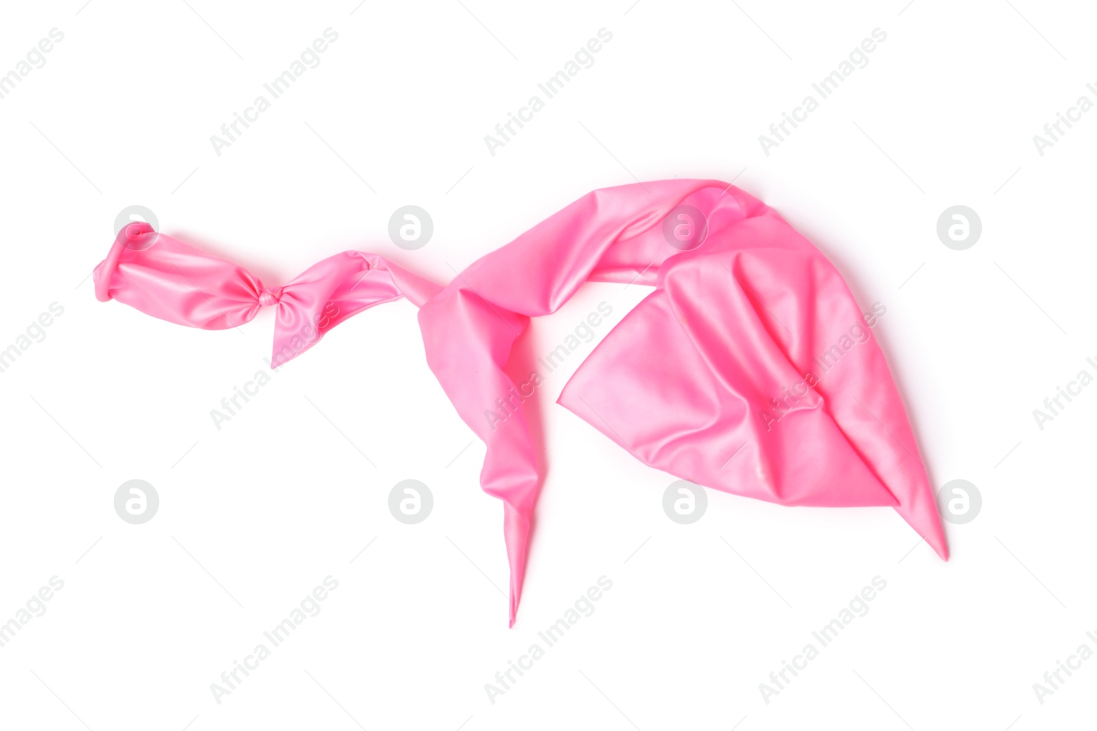 Photo of One pink popped balloon isolated on white, top view