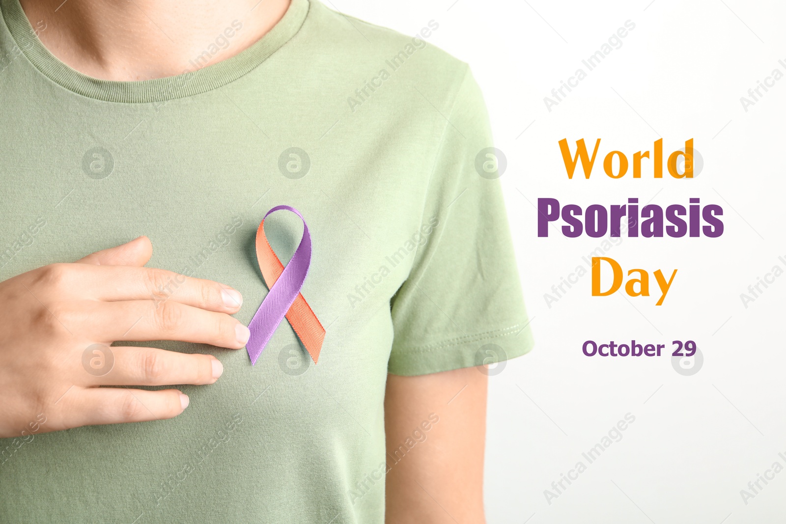 Image of World Psoriasis Day (October, 29). Woman with orange-orchid awareness ribbon on white background, closeup