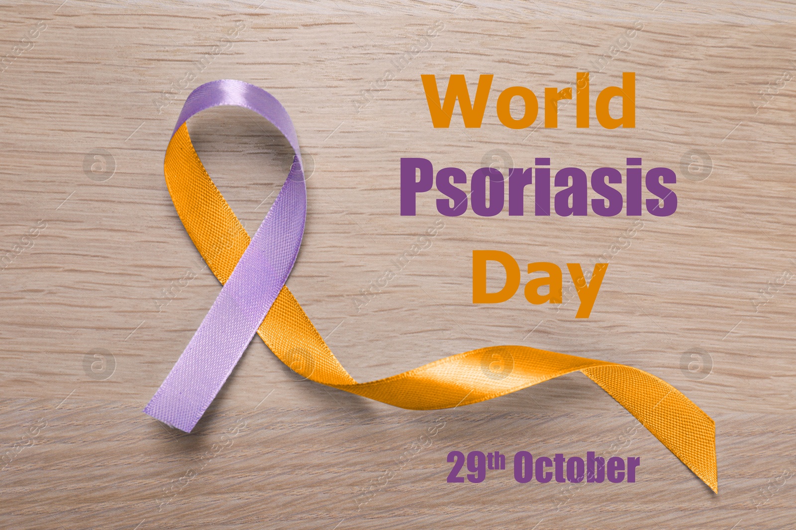 Image of World Psoriasis Day (October, 29). Orange-orchid awareness ribbon on wooden background, top view