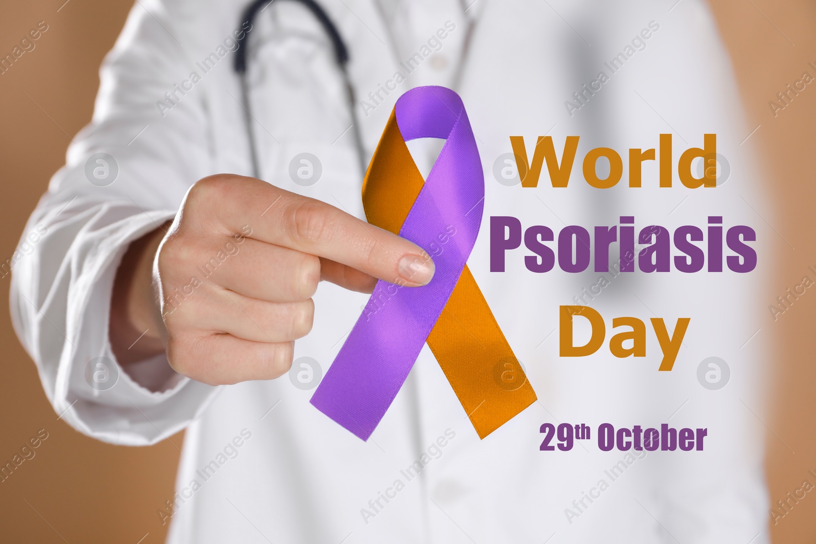 Image of World Psoriasis Day (October, 29). Doctor holding orange-orchid awareness ribbon on dark beige background, closeup