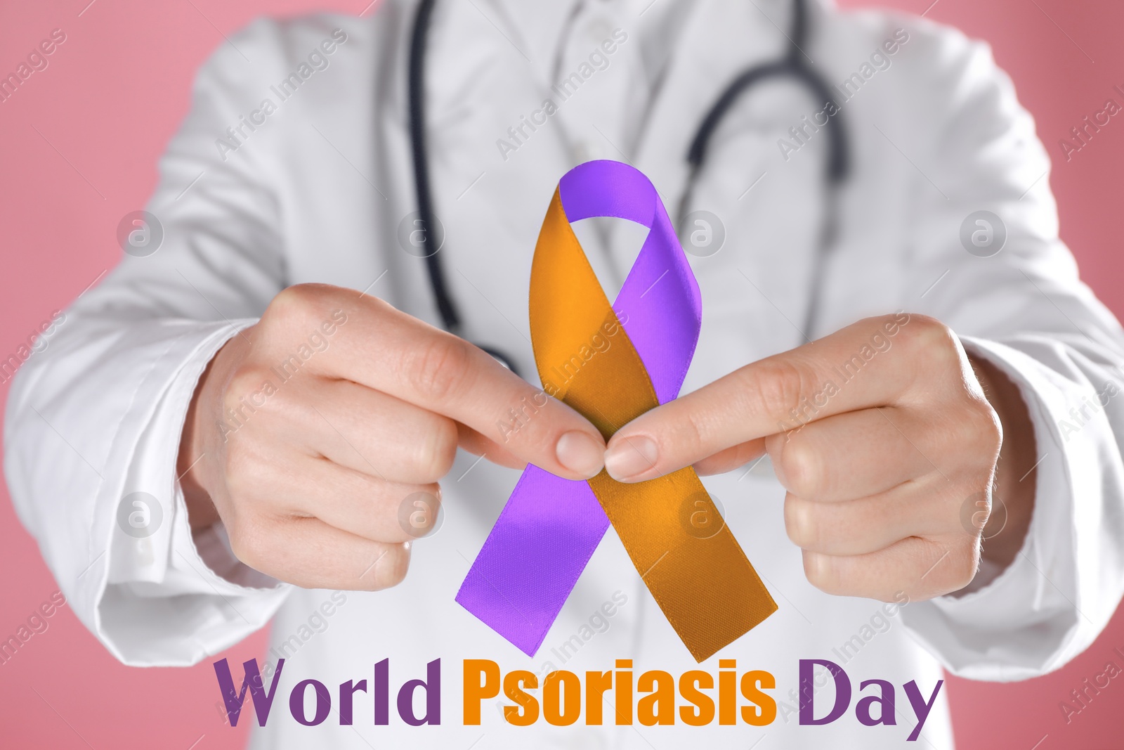 Image of World Psoriasis Day. Doctor holding orange-orchid awareness ribbon on pink background, closeup