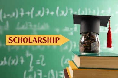 Image of Scholarship. Glass jar with coins, graduate hat and books against green chalkboard