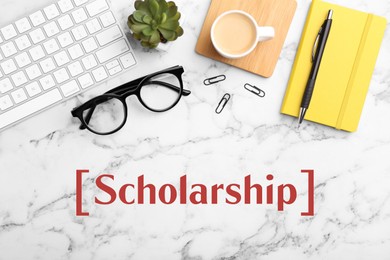 Image of Scholarship. Flat lay composition with different office stationery on white marble table