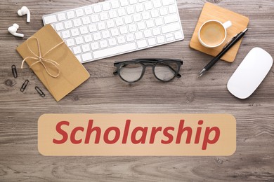 Image of Scholarship. Flat lay composition with computer keyboard and mouse on wooden table