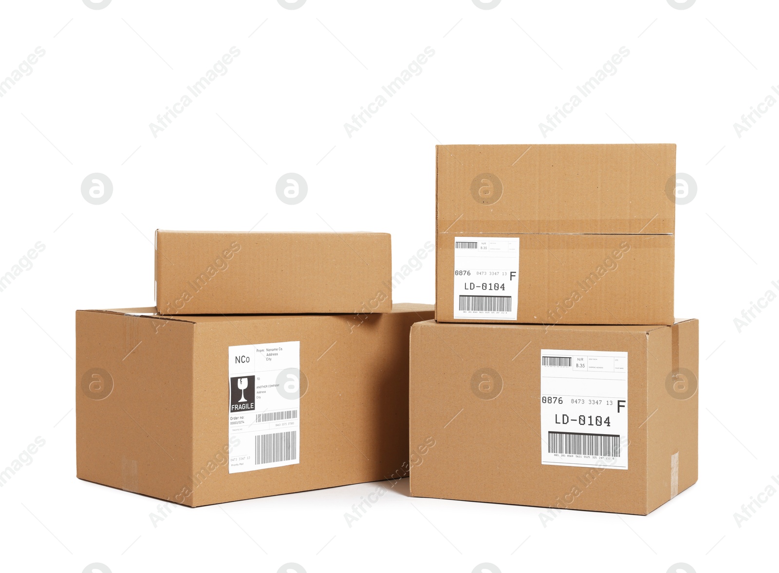 Photo of Many parcels with shipment labels isolated on white