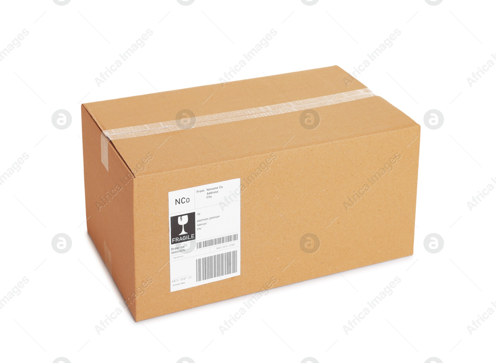 Photo of One parcel with shipment label isolated on white