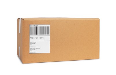 Photo of One parcel with shipment label isolated on white