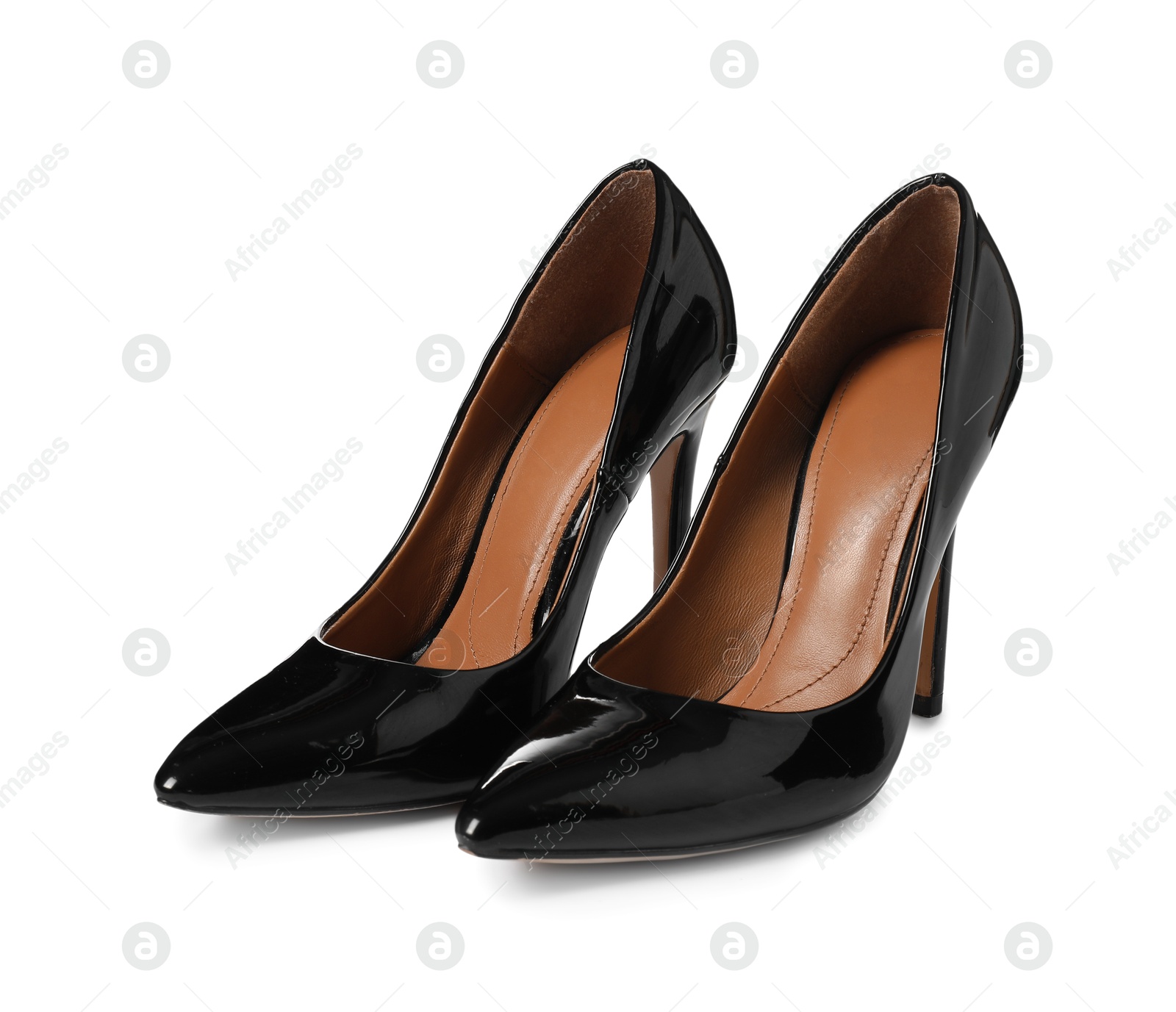 Photo of Beautiful black high heeled shoes isolated on white