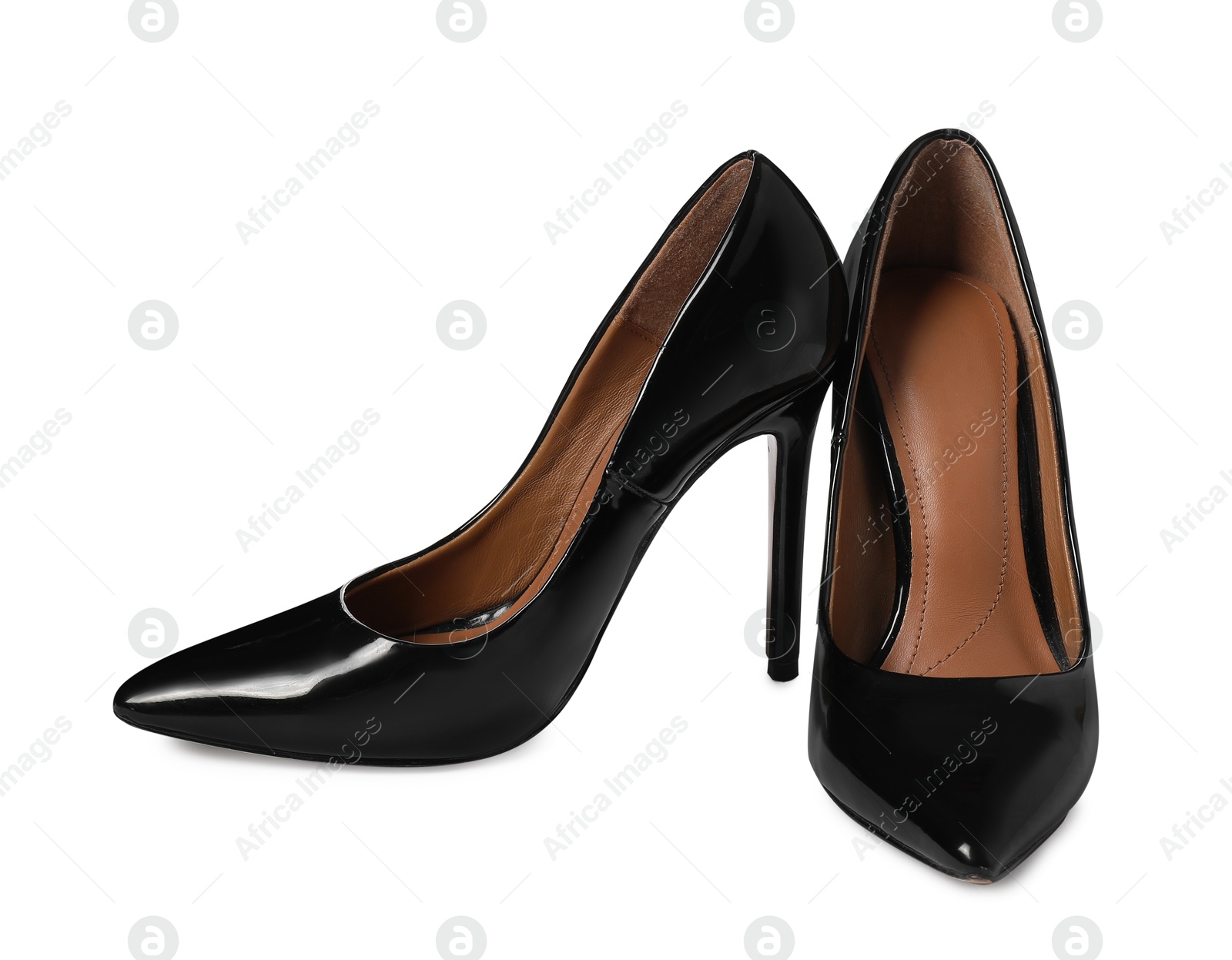 Photo of Beautiful black high heeled shoes isolated on white