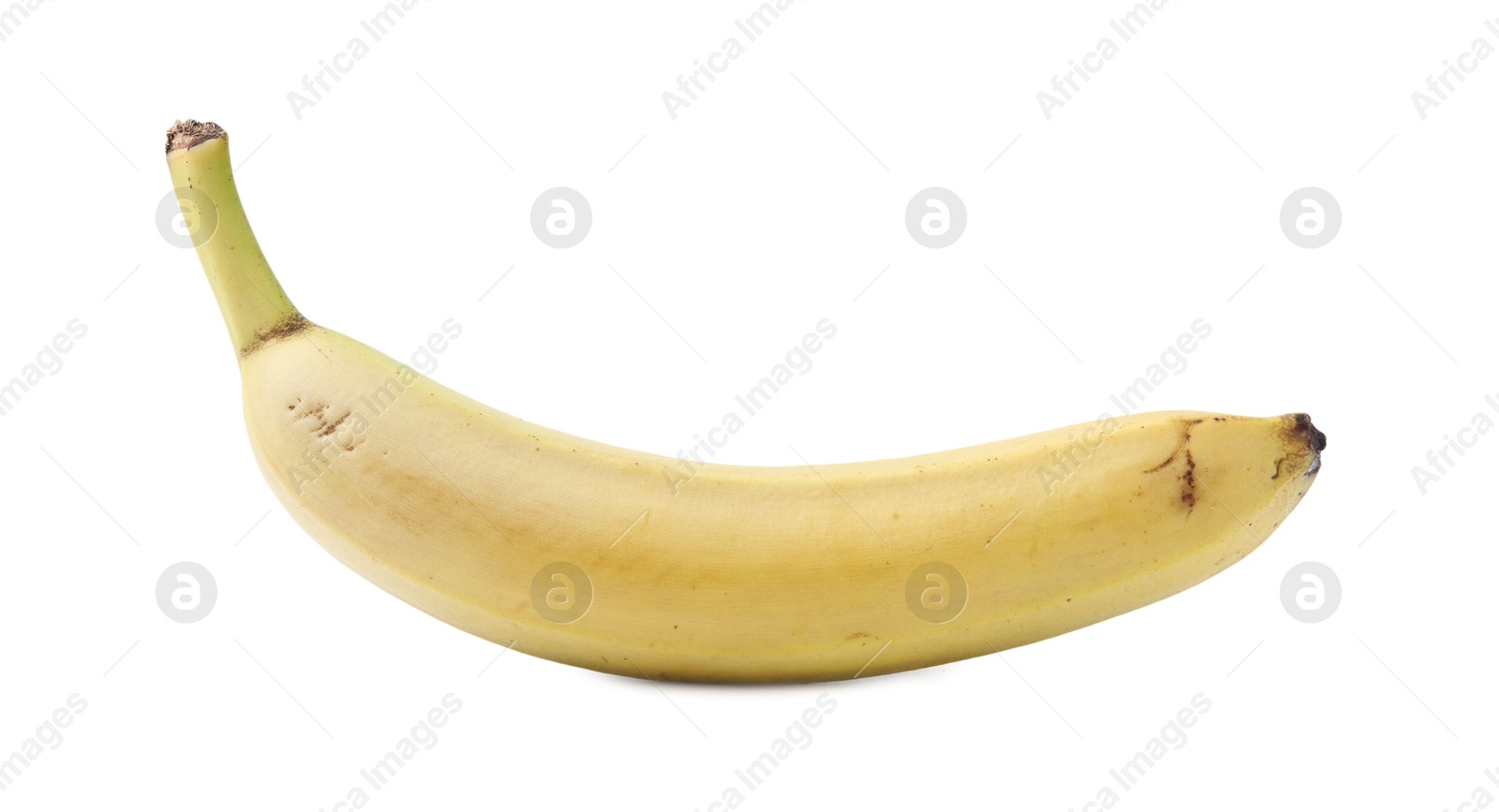 One whole ripe banana isolated on white Photo of One whole ripe banana isolated on white