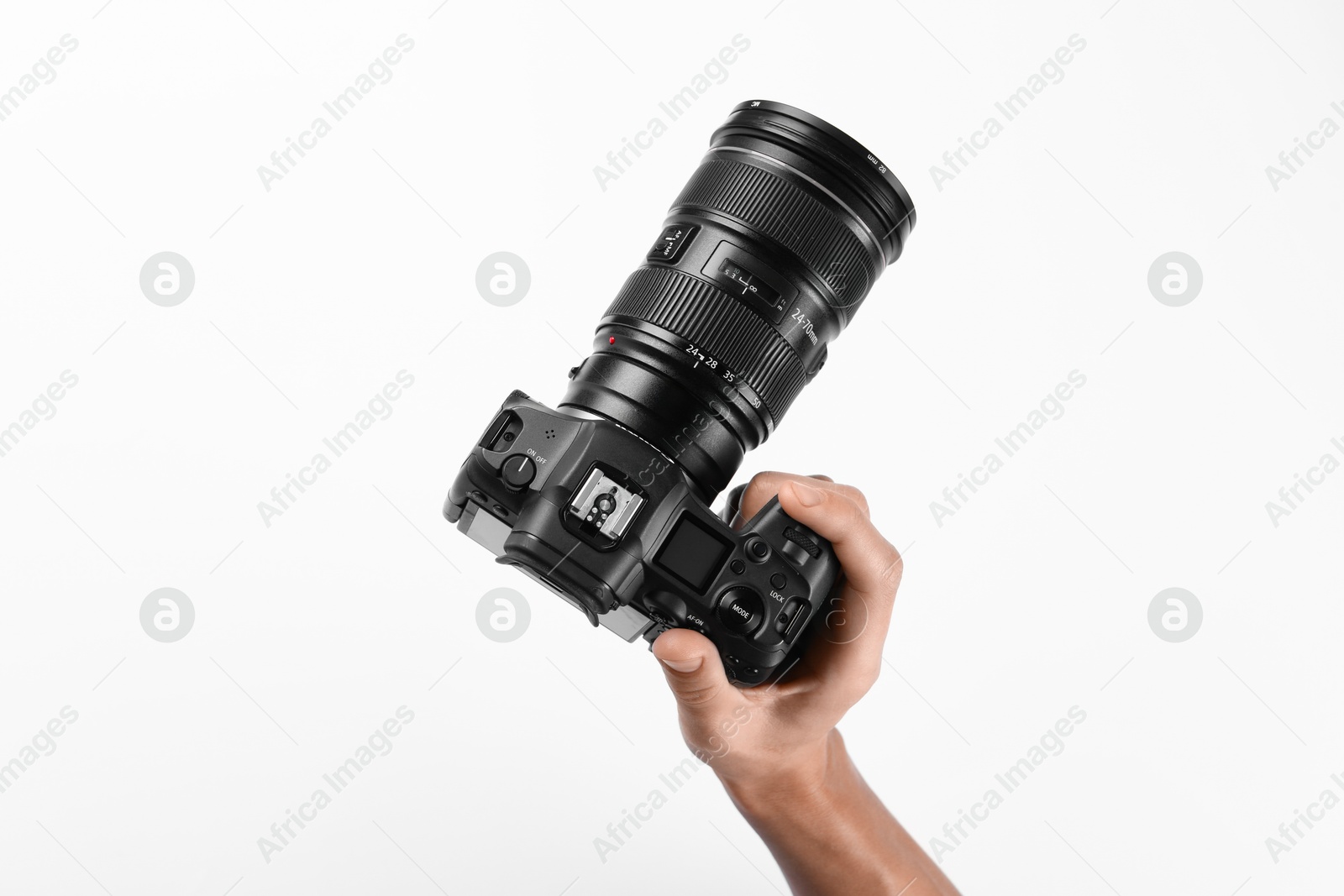 Photo of Photographer with professional camera on white background, top view