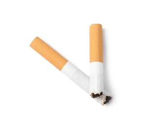 Photo of Two cigarette butts isolated on white, top view. Smoking habit