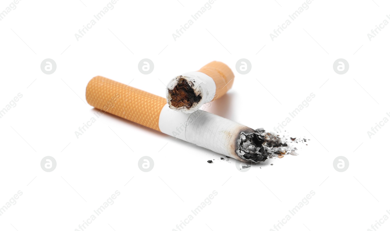 Photo of Two cigarette butts isolated on white. Smoking habit