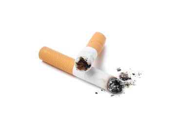 Photo of Two cigarette butts isolated on white. Smoking habit