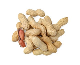 Photo of Pile of fresh peanuts isolated on white, top view