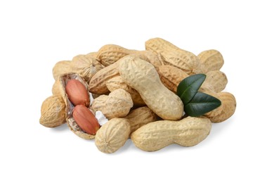 Photo of Pile of fresh peanuts and green leaves isolated on white