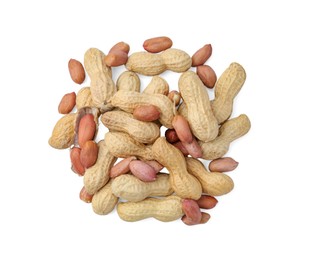 Photo of Pile of different peanuts isolated on white, top view