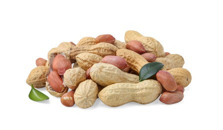 Photo of Pile of different peanuts and green leaves isolated on white