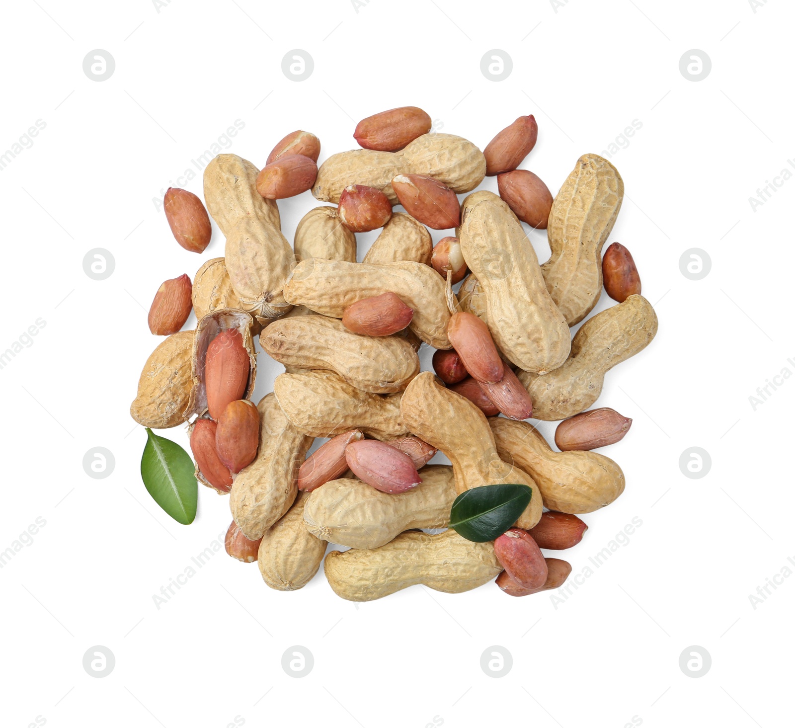 Pile of different peanuts and green leaves isolated on white, top view Photo of Pile of different peanuts and green leaves isolated on white, top view