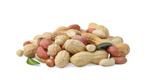Photo of Pile of different peanuts and green leaves isolated on white