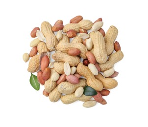 Photo of Pile of different peanuts and green leaves isolated on white, top view