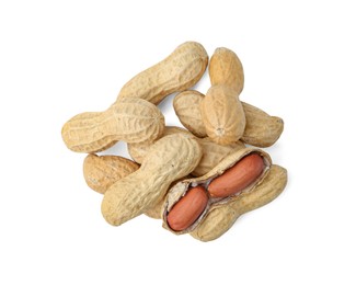 Photo of Pile of fresh peanuts isolated on white, top view