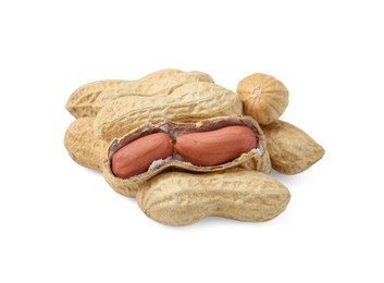 Photo of Pile of fresh peanuts isolated on white