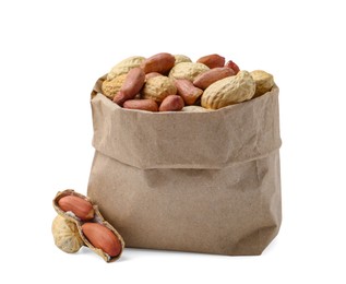 Photo of Fresh peanuts in paper bag isolated on white