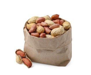 Photo of Fresh peanuts in paper bag isolated on white