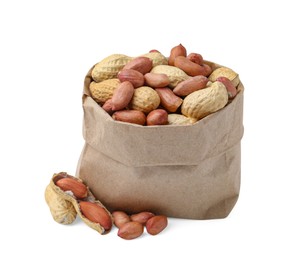 Photo of Fresh peanuts in paper bag isolated on white