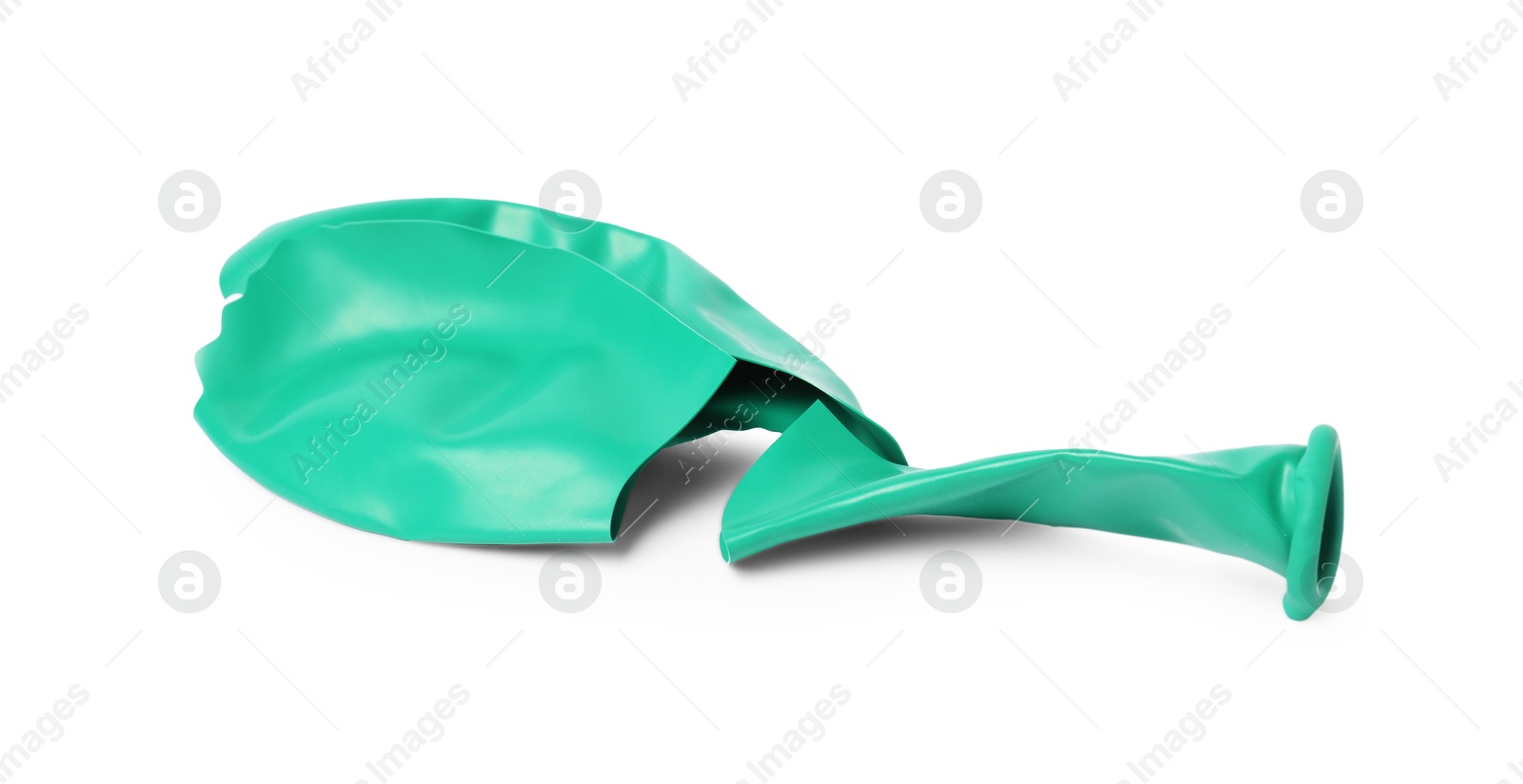 Photo of One green popped balloon isolated on white