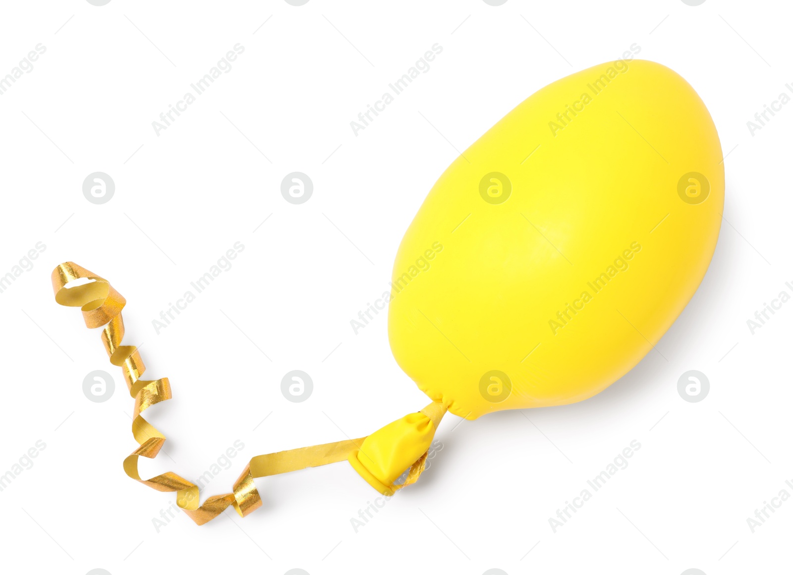 Photo of One yellow half deflated balloon isolated on white, top view