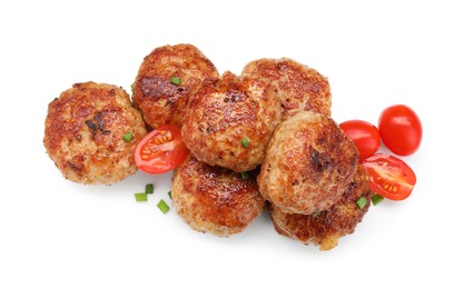 Photo of Delicious patties with cherry tomatoes and green onions isolated on white, top view