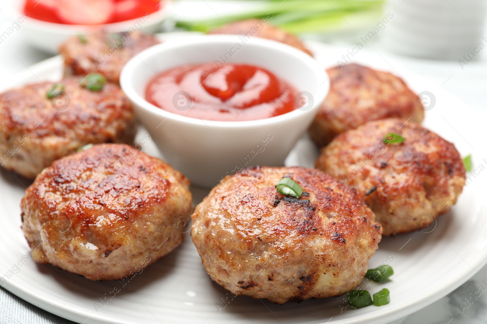 Photo of Delicious patties served on white table, closeup