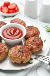 Photo of Delicious patties served on white table, closeup