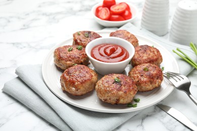 Photo of Delicious patties served on white table, closeup