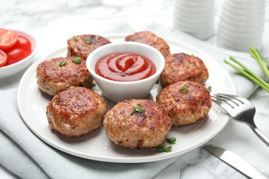 Photo of Delicious patties served on white table, closeup