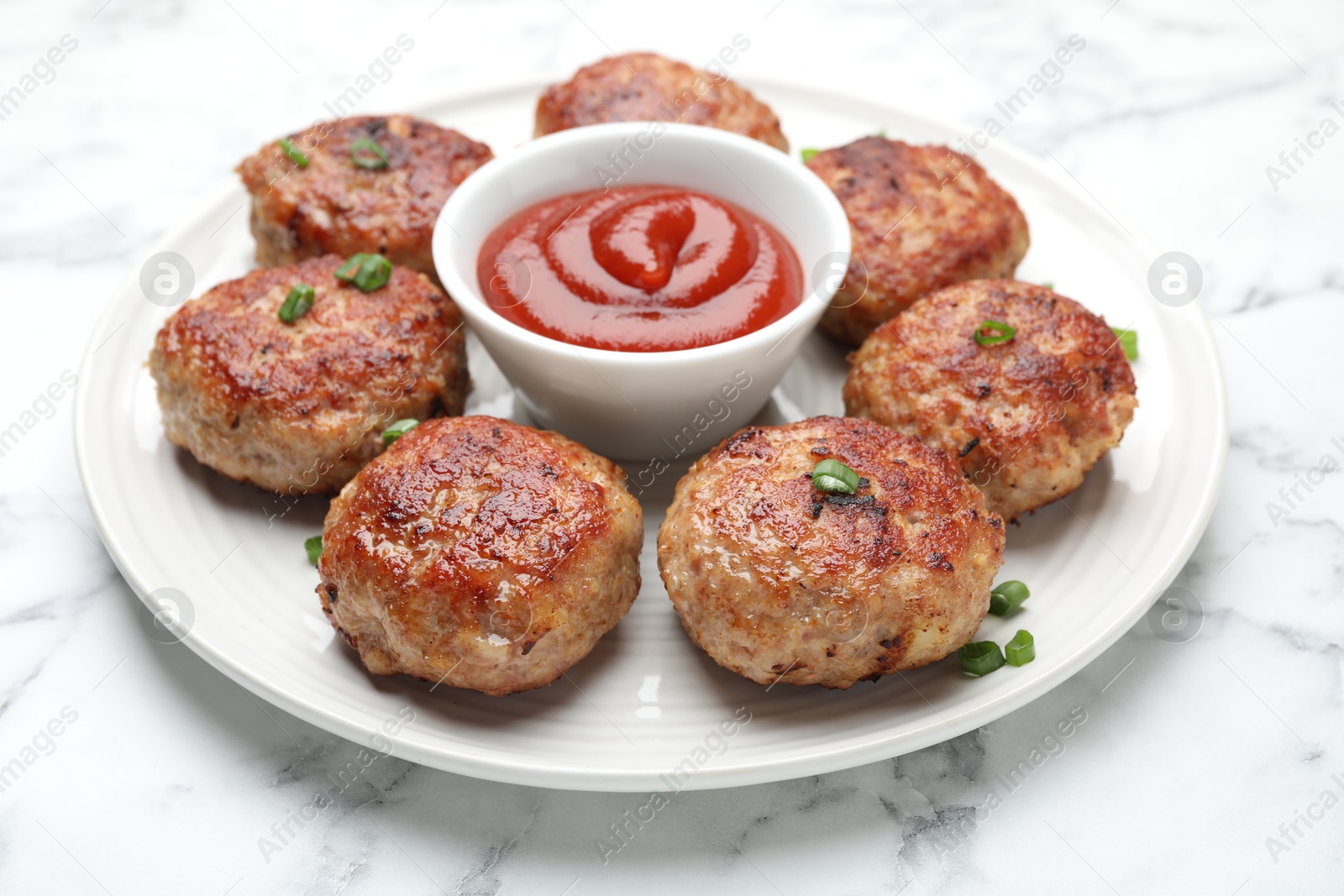 Photo of Delicious patties served on white table, closeup