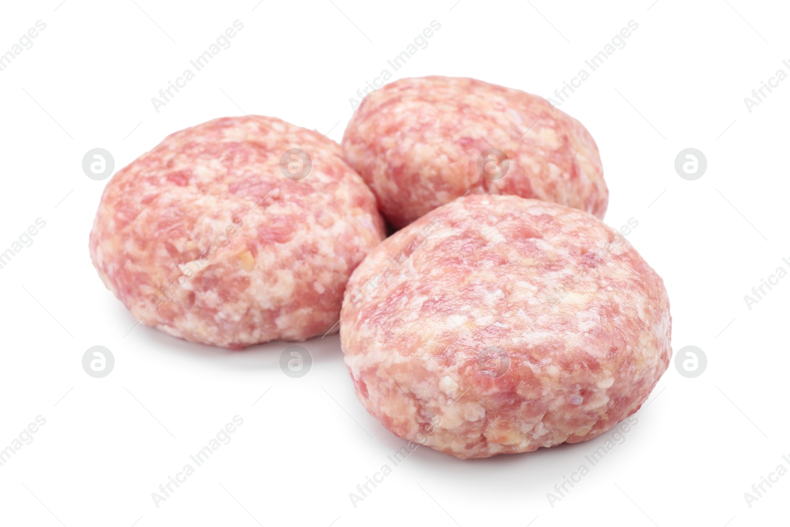 Photo of Three uncooked fresh patties isolated on white