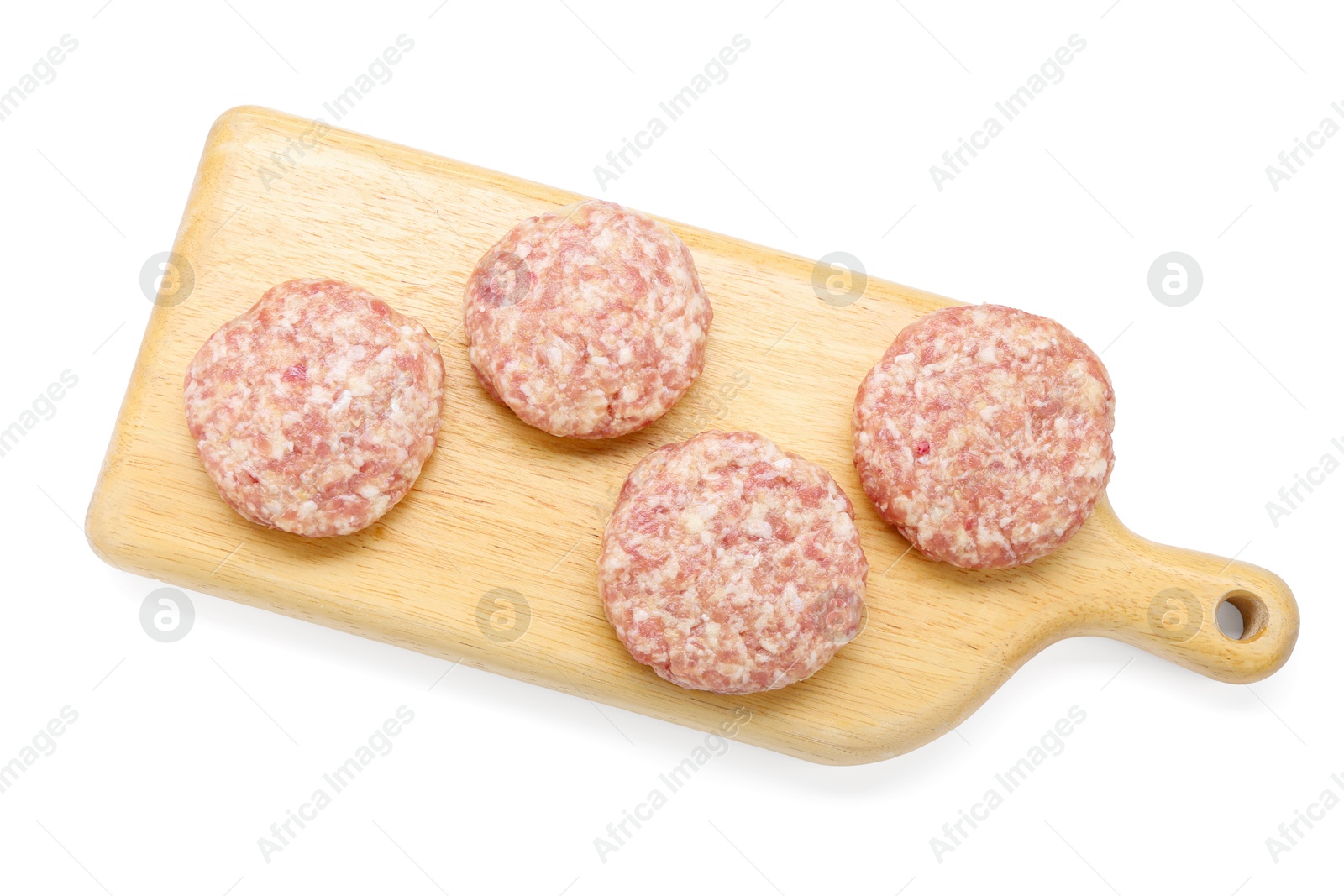 Photo of Many uncooked patties on wooden board against white background, top view