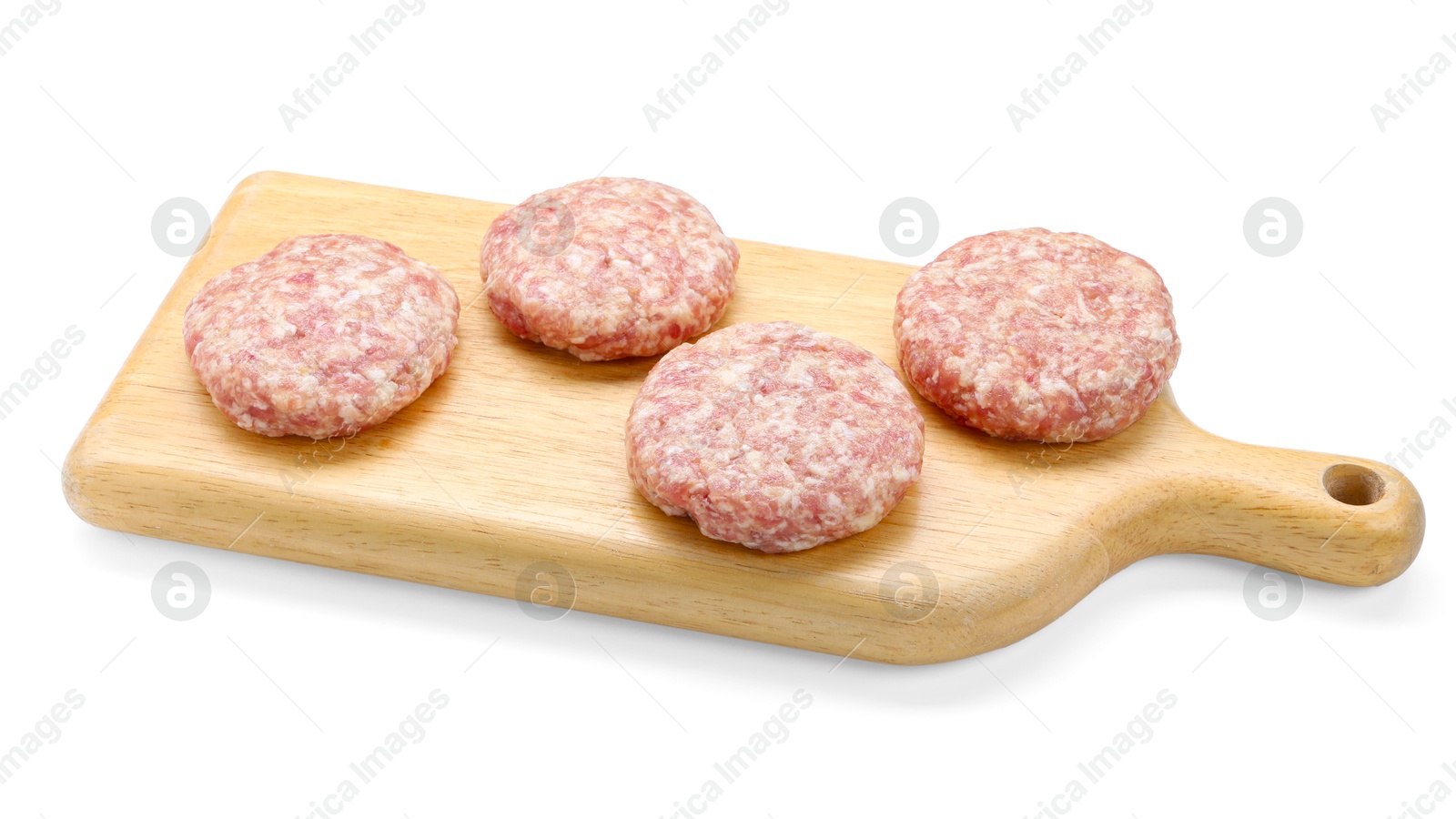 Photo of Many uncooked patties on wooden board against white background