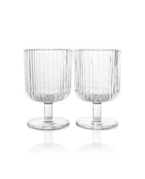 Photo of Two empty clean glasses isolated on white