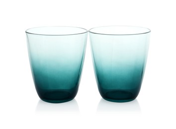 Photo of Two empty clean glasses isolated on white