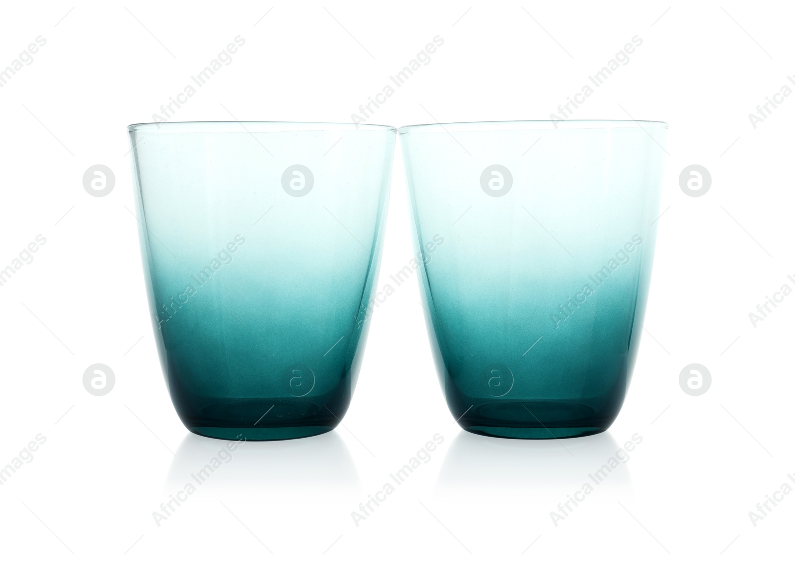 Photo of Two empty clean glasses isolated on white